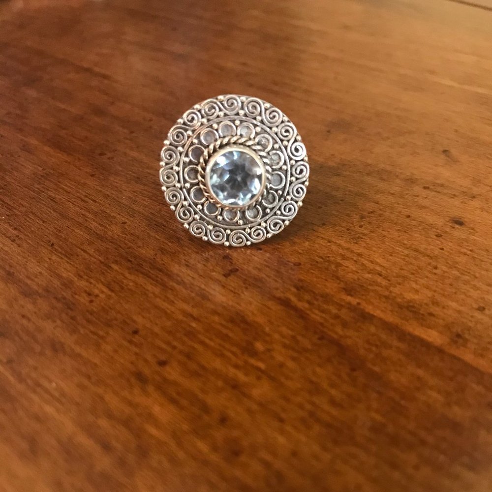 Handcrafted silver and blue topaz statement ring